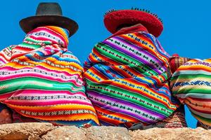 People on a wall in Peru